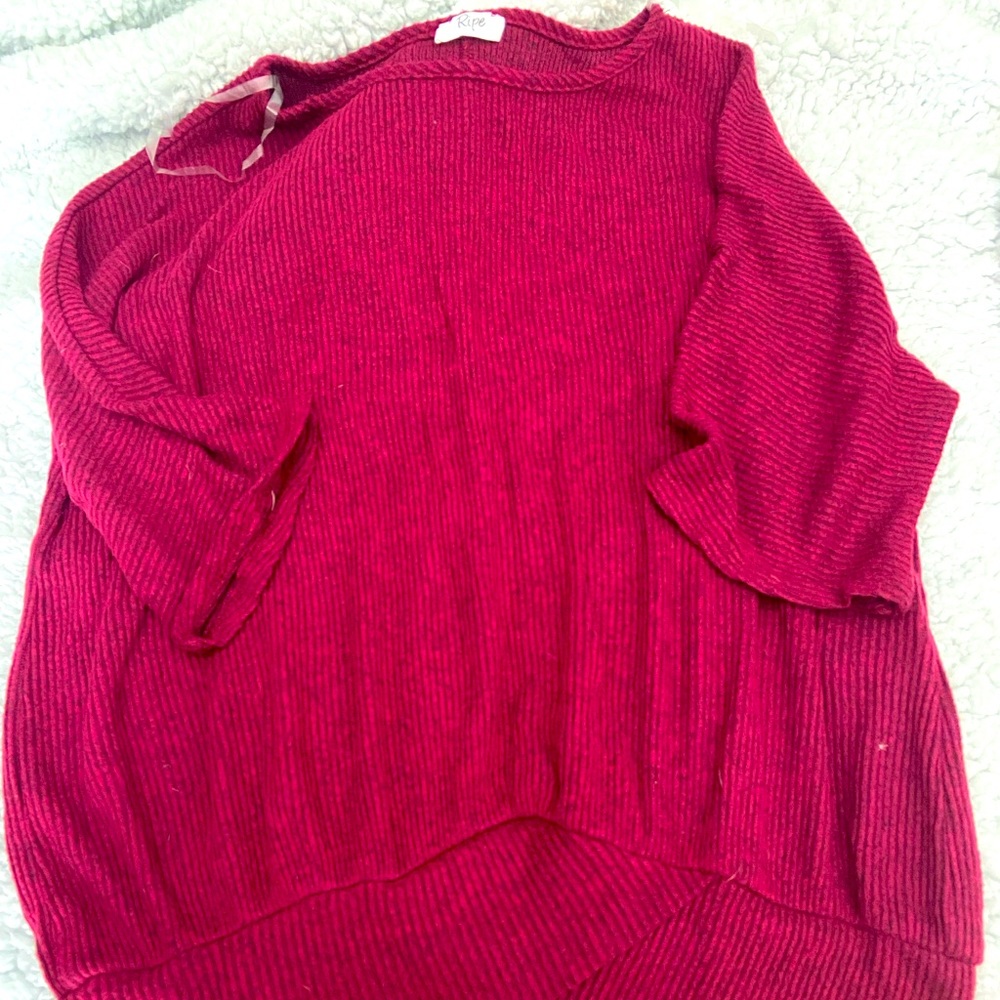 Medium wine coloured 3/4 length (sleeves) shirt.
